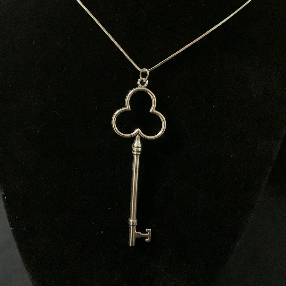Silver key pendant charm